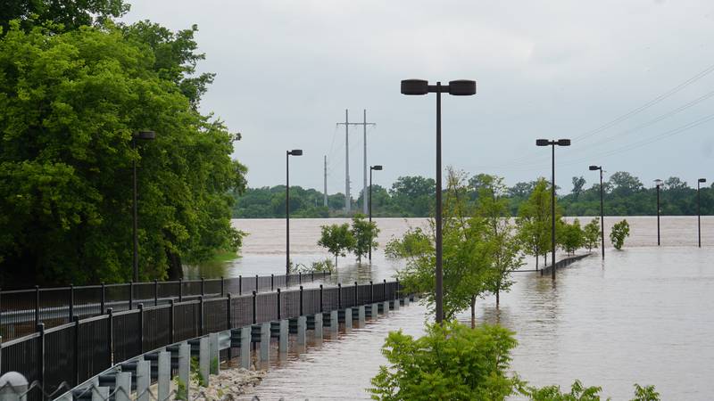 A pedestrian walkway closed due to flooding during a massive release of water into the Arkansas River from the Keystone Dam, May 20, 2019