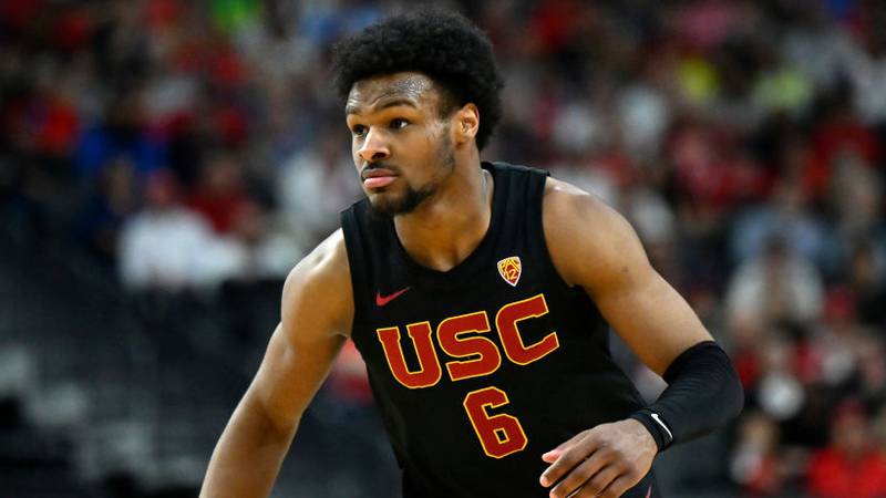 LAS VEGAS, NEVADA - MARCH 14: Bronny James #6 of the USC Trojans looks on in the second half of a quarterfinal game against the Arizona Wildcats during the Pac-12 Conference basketball tournament at T-Mobile Arena on March 14, 2024 in Las Vegas, Nevada. The Wildcats defeated the Trojans 70-49. (Photo by David Becker/Getty Images)