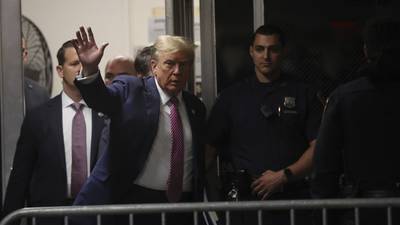 The Latest | Person rushed away on stretcher after fire extinguished outside Trump hush money trial