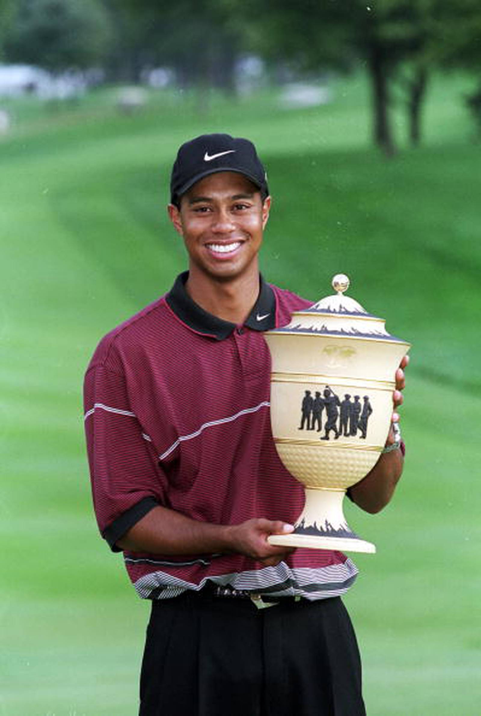 Irons used by Tiger Woods to win 4 straight majors sells for record 5.