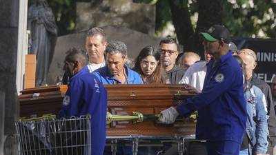 Brazil buries pilot who died in plane crash that killed 62, as questions remain about its cause