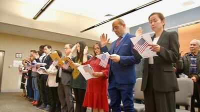 20 people from 10 countries become U.S. citizens at naturalization ceremony at City Hall